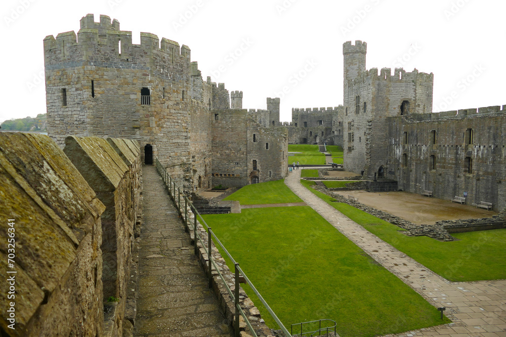 Historic Caernarfon Castle, medieval fortress, popular tourist landmark, Wales, United Kingdom