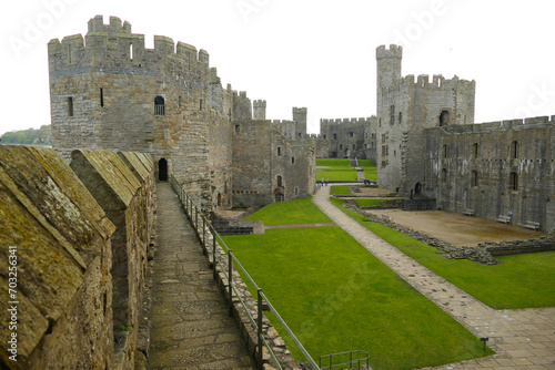 Obraz na płótnie Historic Caernarfon Castle, medieval fortress, popular tourist landmark, Wales, United Kingdom w salonie