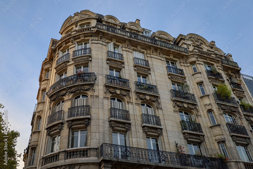 typical parisians building facade , haussmannian style  15th arrondissement