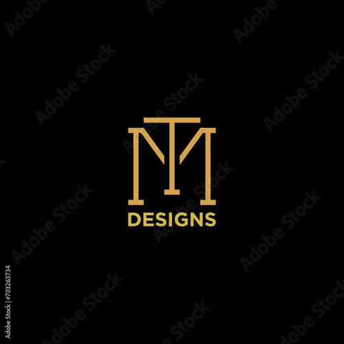 letter mt or tm luxury monogram logo design photo