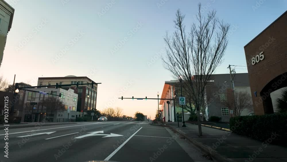 Hyper-lapse of cars going through a busy street in downtown Wilmington.