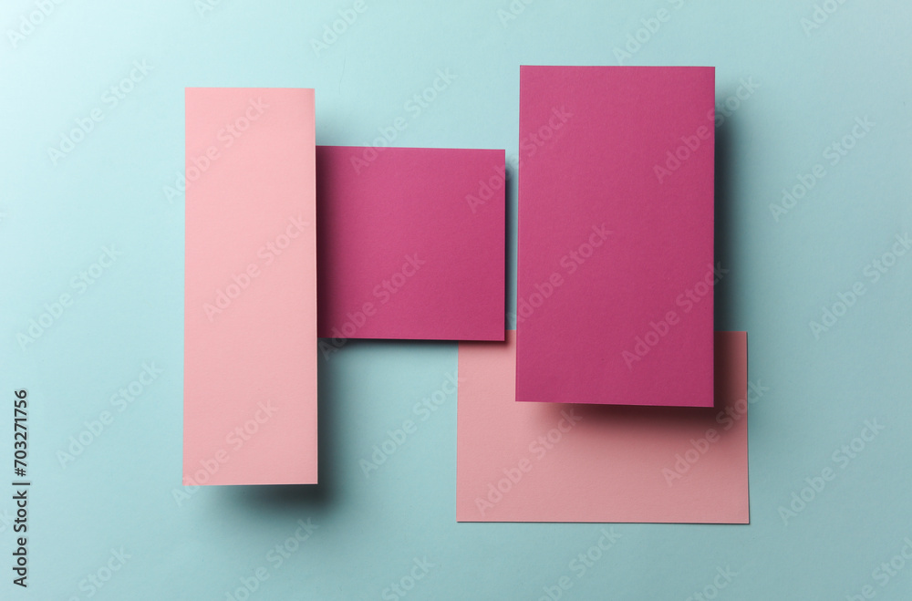 Set of pink floating blank card sheets with shadow on blue background. Minimalism business brand template, creative layout Set of pink floating blank card sheets with shadow on blue background. Minimalism business brand template, creative layout