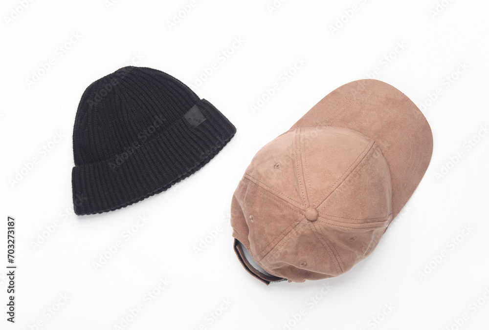 Beanie hat and baseball cap on white background Beanie hat and baseball cap on white background