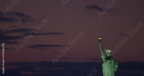 Evening Sky with Illuminated Statue of Liberty