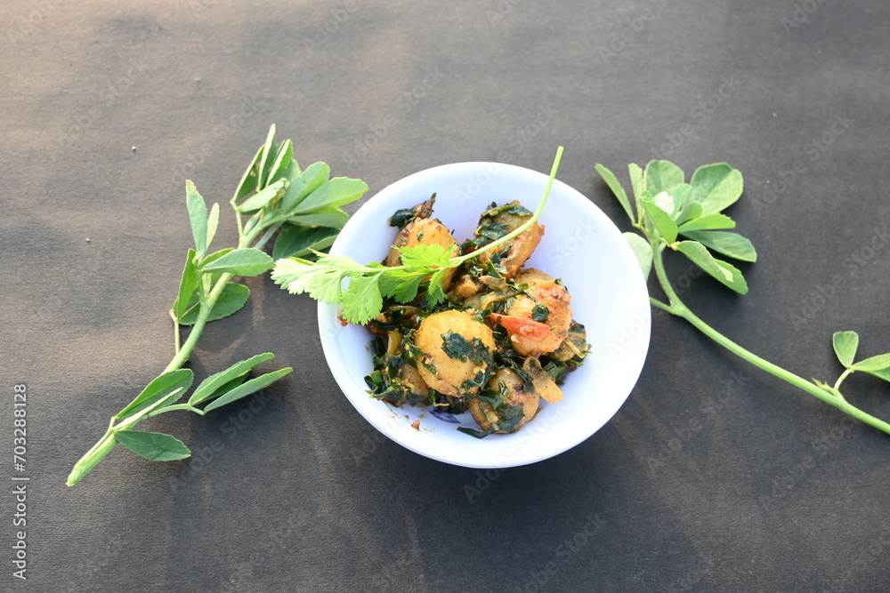 Aloo Methi or Fenugreek potato vegetable. It is made with fresh