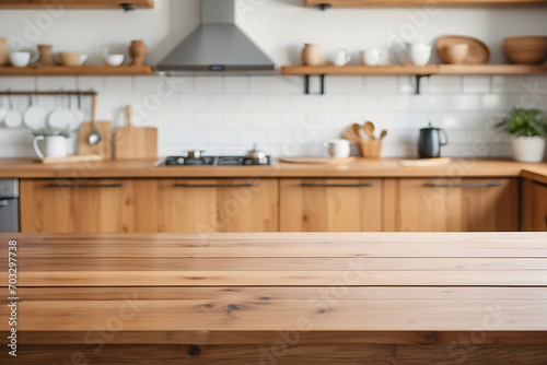 Empty wooden table with a blurred kitchen background and copy space