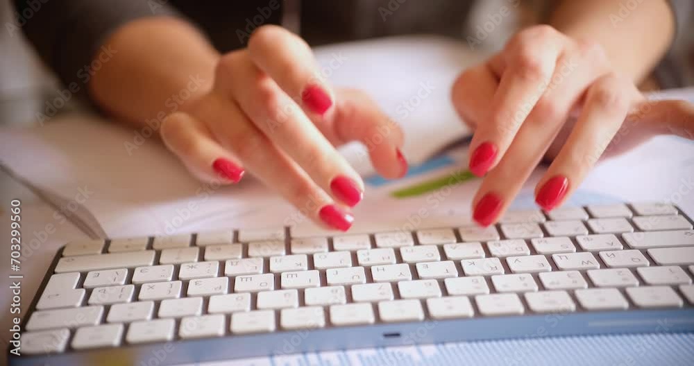Closeup of writer handwriting on laptop on desk at home or office. Remote work as a programmer, copywriter or marketer