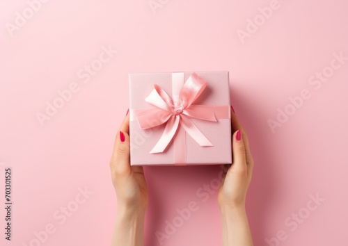 Top view concept photo of woman's day composition gift boxes with bows ribbon flowers on isolated pastel background with copyspace for text © Bold24