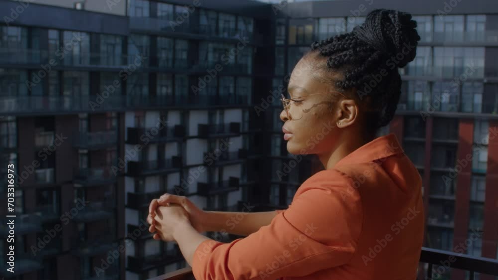 Urban Contemplation - Woman on Balcony
