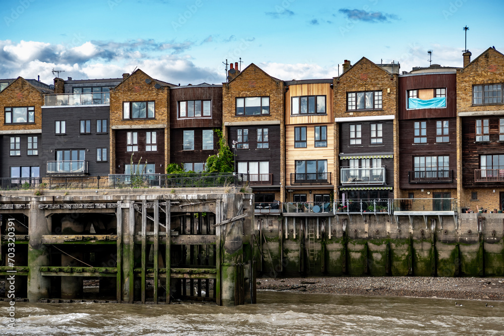 Narrow Houses And Apartments At The Embankment Of River Thames In London, United Kingdom