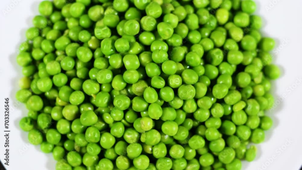 Close Up Green Peas Background Rotating. Macro Shot Fresh Organic Green Peas. Vegetable Harvest Healthy Eating. Beautiful Texture Close-up of Fresh Green Peas. Healthy Vegetarian food. Close Up Green Peas Background Rotating. Macro Shot Fresh Organic Green Peas. Vegetable Harvest Healthy Eating. Beautiful Texture Close-up of Fresh Green Peas. Healthy Vegetarian food.