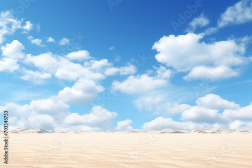 sand dunes blue sky and fluffy clouds photo
