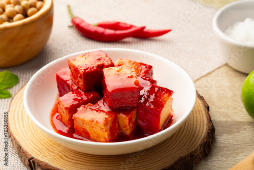 Fermented bean curd in white plate(Red Sufu) ,Chinese Cheese
