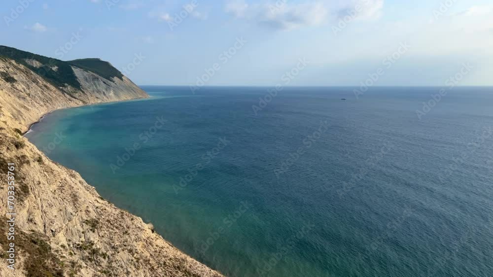 Panoramic view of the sea surface from the coast. Black Sea, Anapa, Krasnodar Territory, Russia. Sunset view of Bald Mountain near the village of Supseh. The beach has 800 steps. 4K Video Panoramic view of the sea surface from the coast. Black Sea, Anapa, Krasnodar Territory, Russia. Sunset view of Bald Mountain near the village of Supseh. The beach has 800 steps. 4K Video