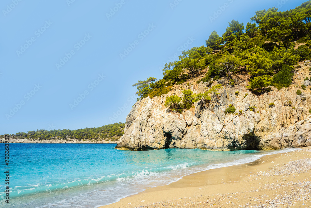 Beautiful rocky sandy beach in Turkey on the Mediterranean Sea.