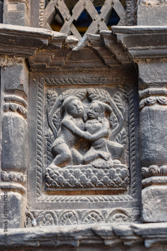 Couple carved in wood in a Temple in Kathmandu, Nepal