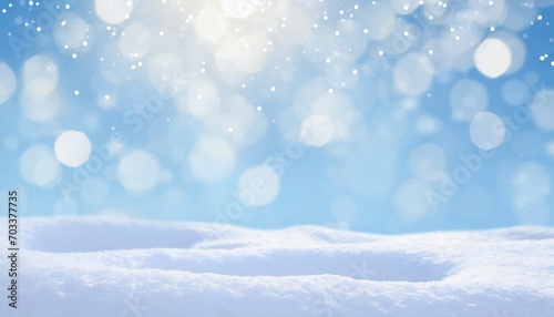 winter natural snow background with snowdrifts beautiful light and snow flakes on blue sky beauty bokeh circles copy space
