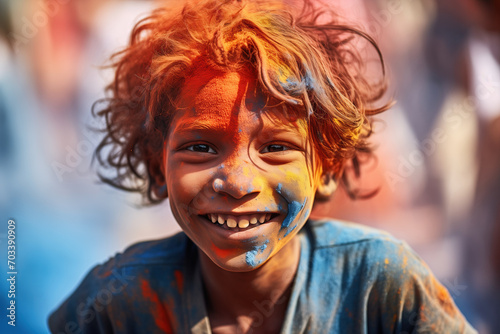 Cheerful Boy Celebrating with Colorful Face Paint at Holi Festival