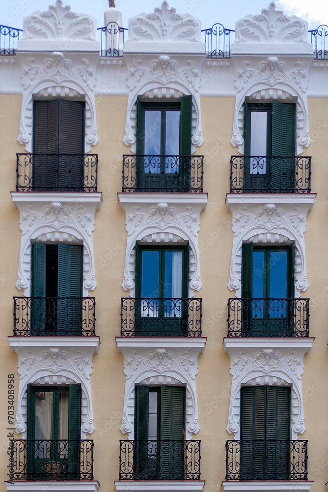 Facade of a residential building in Madrid, Spain in the Lavapies barrio