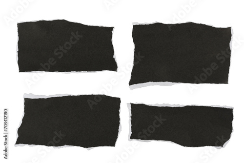 Papel rasgado y cortado en trozos de color negro sobre fondo blanco,  cuatri trozos, recurso gráfico photo