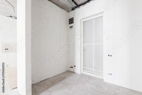 interior of the apartment without decoration in gray colors. rough finish