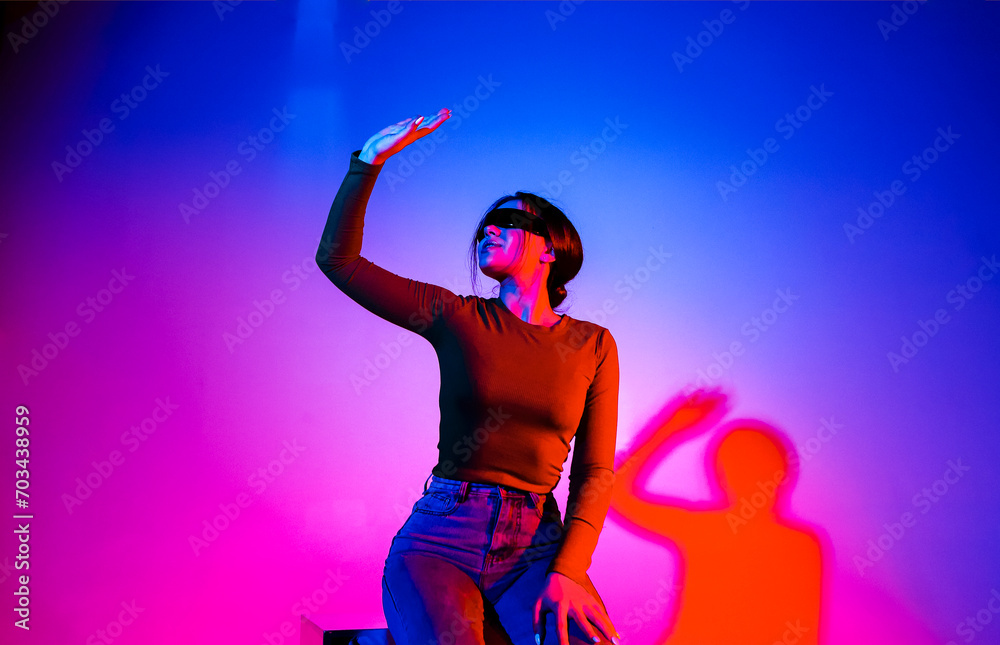 Futuristic woman in neon light