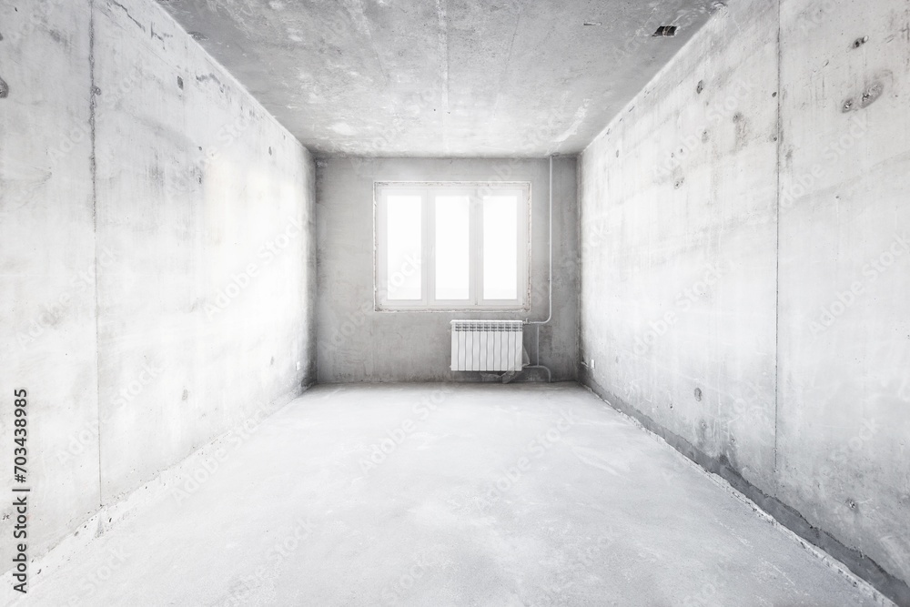 interior of the apartment without decoration in gray colors. rough finish interior of the apartment without decoration in gray colors. rough finish