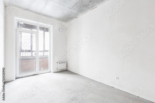 interior of the apartment without decoration in gray colors. rough finish