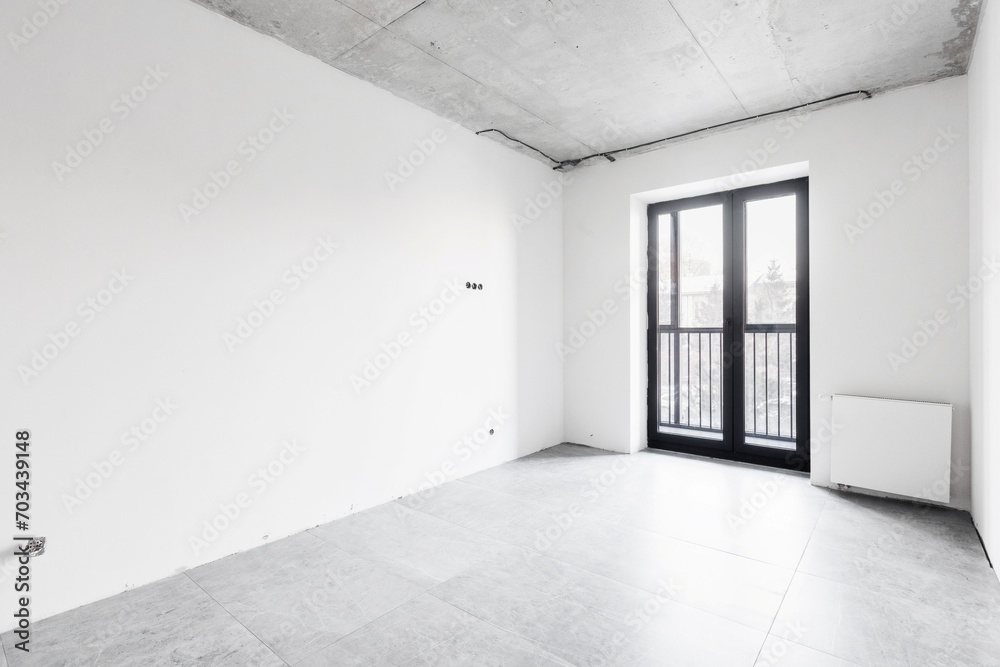interior of the apartment without decoration in gray colors. rough finish interior of the apartment without decoration in gray colors. rough finish