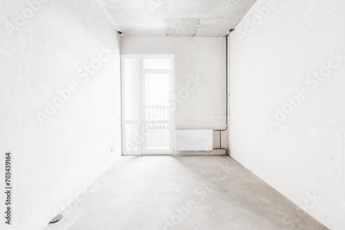 interior of the apartment without decoration in gray colors. rough finish