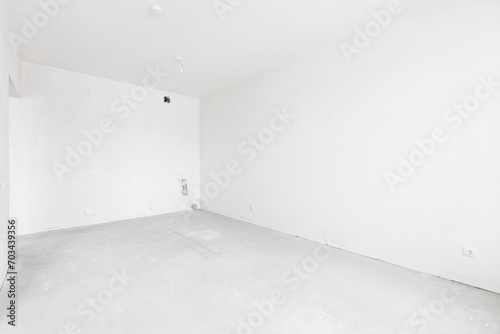 interior of the apartment without decoration in gray colors. rough finish