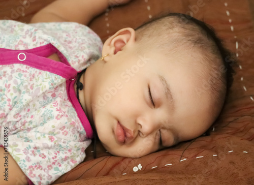 cute Indian little child sleeping close up