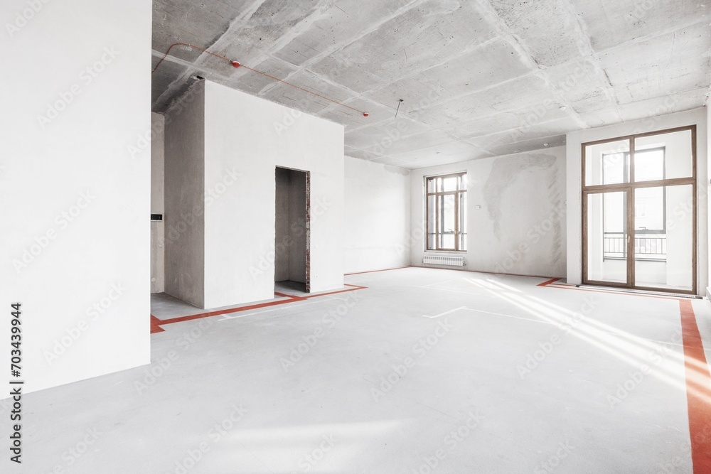 interior of the apartment without decoration in gray colors. rough finish interior of the apartment without decoration in gray colors. rough finish