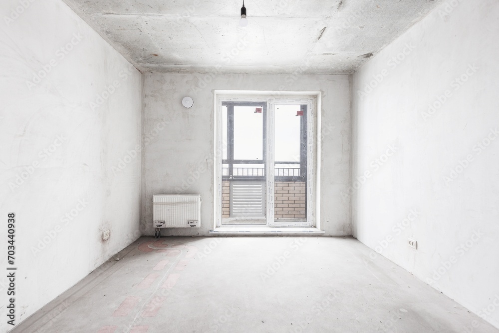 interior of the apartment without decoration in gray colors. rough finish interior of the apartment without decoration in gray colors. rough finish