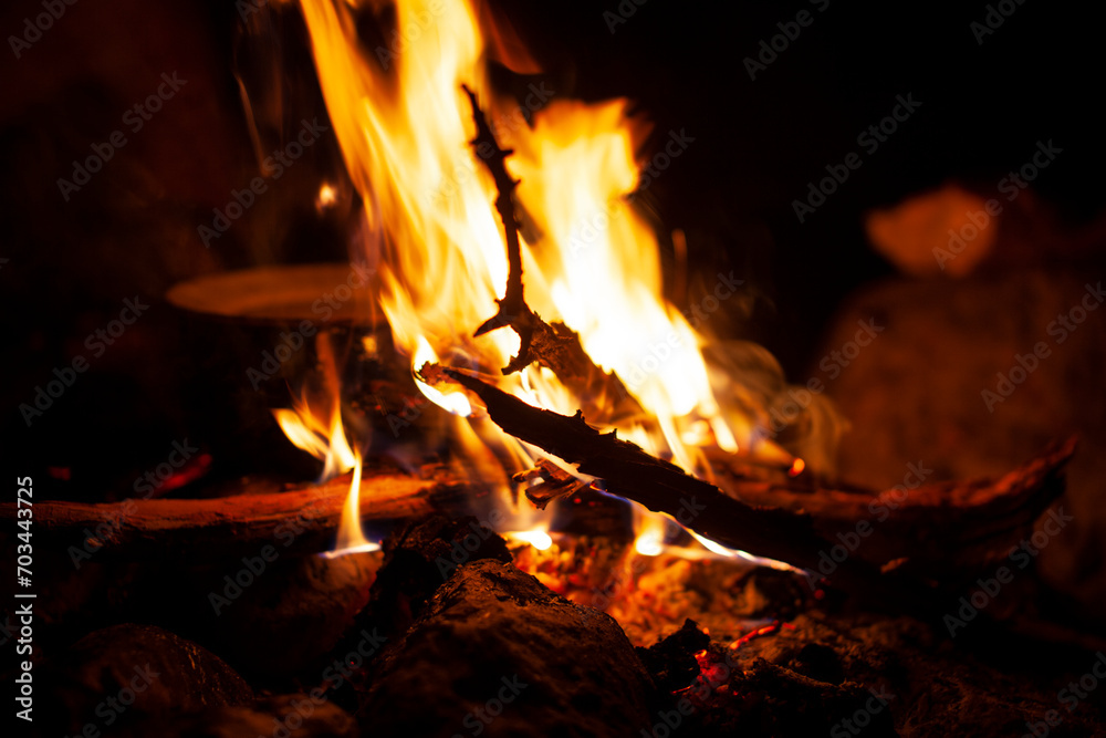 dark scene of camp fire with pot, lifestyle people concept dark scene of camp fire with pot, lifestyle people concept
