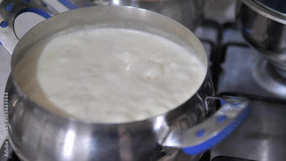 Soup boiling in a pot on the stove, Soup boiling in a pot on the stove,