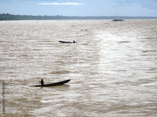 Ribeirinhos no rio Amazonas photo