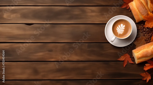 A cup of coffee with bread on wood background with  with copy space.