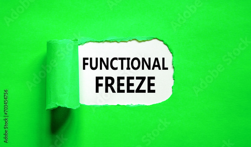 Functional freeze symbol. Concept words Functional freeze on beautiful white paper. Beautiful green paper background. Business psychology functional freeze concept. Copy space.