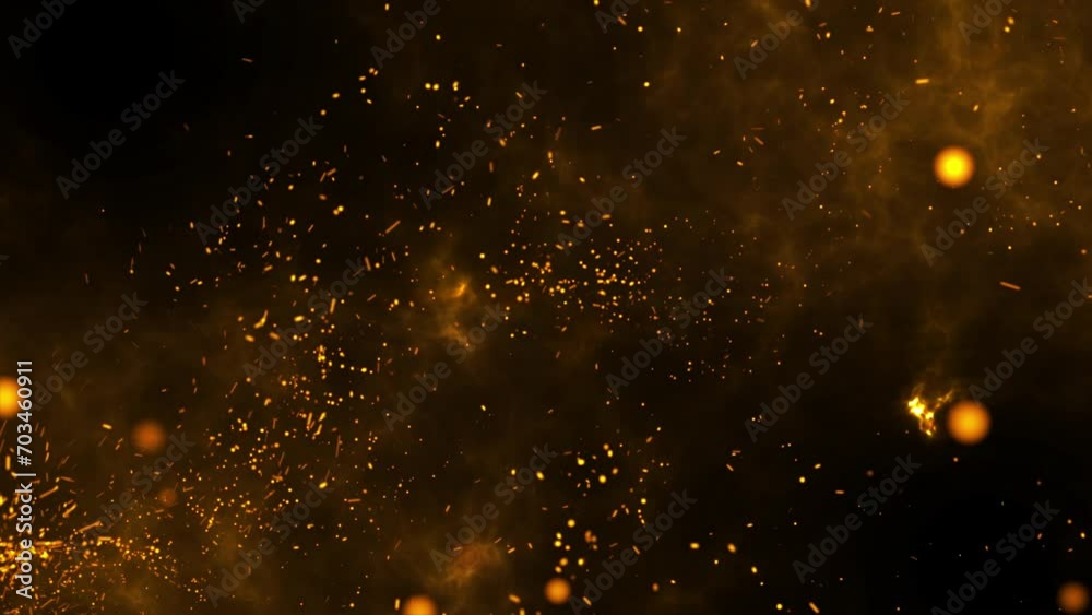 Golden particles fly and burn, background with fire