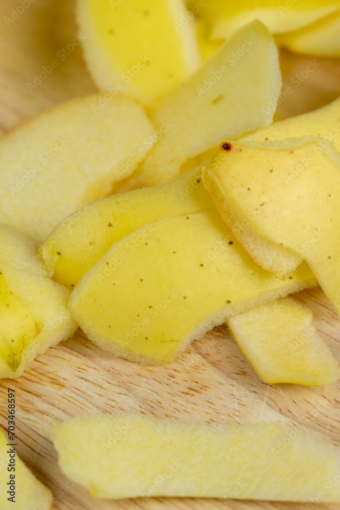 yellow ripe apple with cinnamon on the table yellow ripe apple with cinnamon on the table