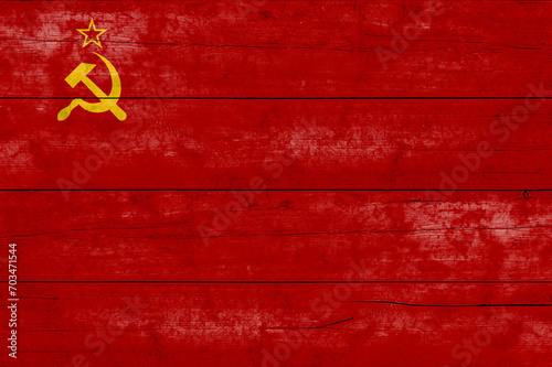Soviet Union flag on a wooden surface. USSR grunge flag banner. photo