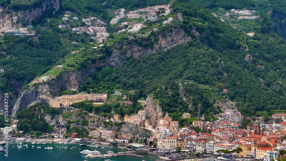 Amalfi coast view at sunrise, Italian seaside near Naples, towns of Amalfi and Atrani from above. Italian idyllic seaside resort, Amazing aerial footage of seaside old town. Amalfi coast view at sunrise, Italian seaside near Naples, towns of Amalfi and Atrani from above. Italian idyllic seaside resort, Amazing aerial footage of seaside old town.