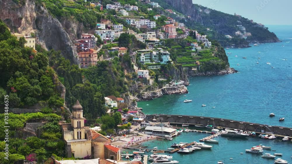 Amalfi coast view at sunrise, Italian seaside near Naples, towns of Amalfi and Atrani from above. Italian idyllic seaside resort, Amazing aerial footage of seaside old town. 