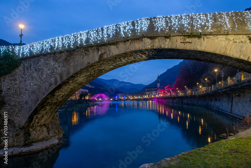 Romanesque style bridge that crosses the Brembo river