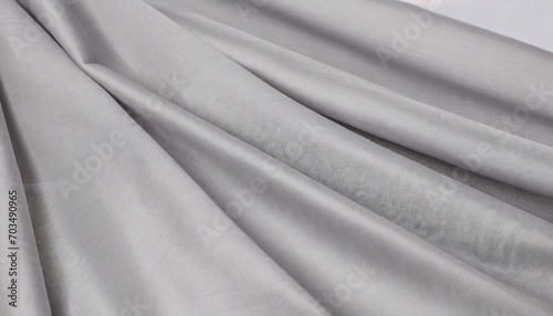 gray fabric folded folds background