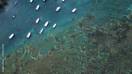 Boats and low tide in the lagoon of Etang Sale at Reunion Island