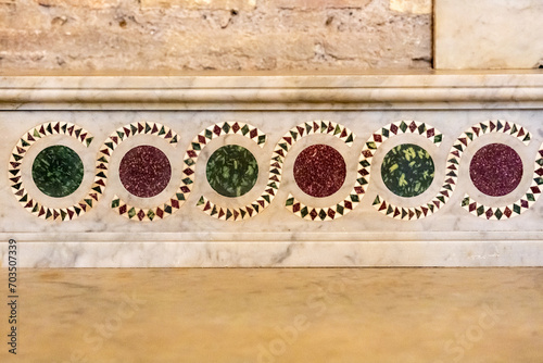 Photography Close-up on decorative pattern on church wall in Italy