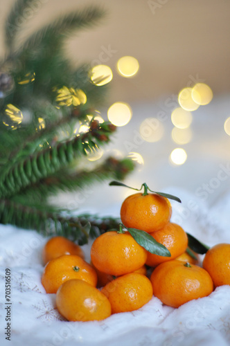 fresh tangerines in christmas festive background