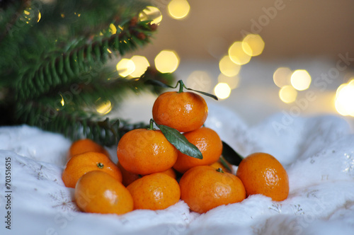 fresh tangerines in christmas festive background